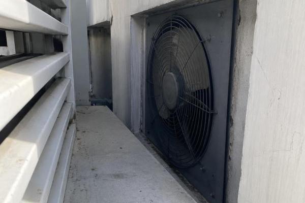 Poor Axial Fan Installation An example of a poorly installed axial fan with obstructions